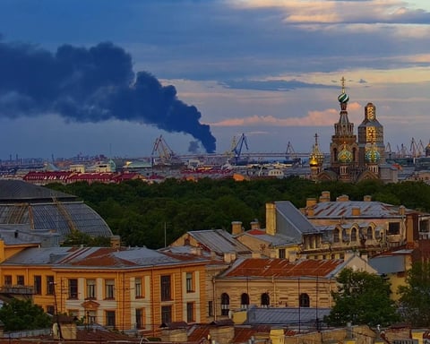 Black smoke rises over St. Petersburg after Ukrainian drone strikes hit the oil terminal on SPIEF opening day