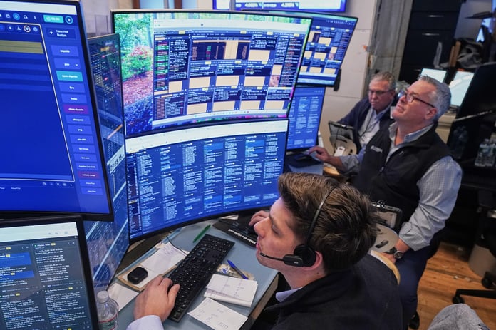 NYSE traders as US stocks post biggest daily gain since April on Trump-Iran peace framework