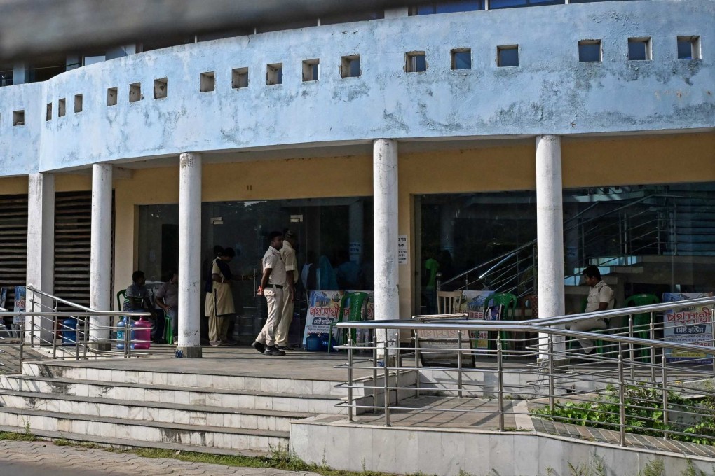 Police guard a verification camp in West Bengal used in India's deportation processing of alleged undocumented migrants