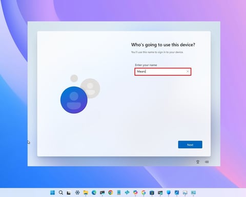 Windows 11 desktop showing the OOBE screen to create a Microsoft account during setup