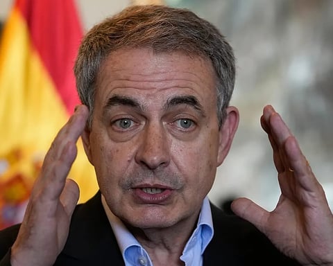 Former Spanish prime minister Jose Luis Rodriguez Zapatero speaks to journalists