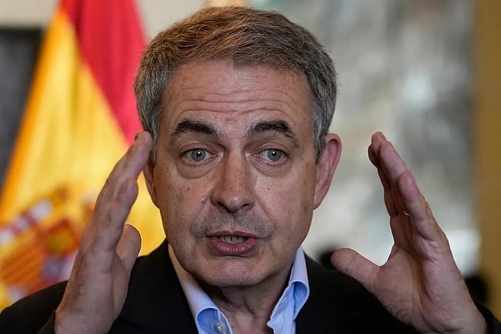 Former Spanish prime minister Jose Luis Rodriguez Zapatero speaks to journalists