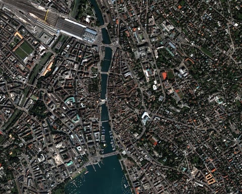 NASA Quickbird satellite high-resolution image of downtown Zurich Switzerland showing the city centre along Lake Zurich with the Limmat River and the Bahnhofstrasse commercial district