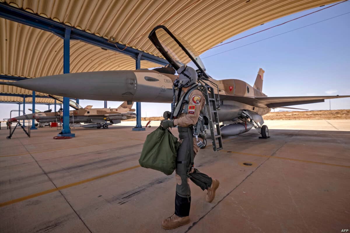 A Moroccan Air Force personnel disembarks after landing at an airbase in Ben Guerir,  about 58 kilometres north of Marrakesh, during the