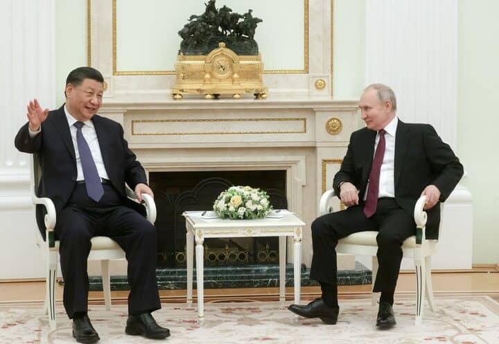 The Kremlin says talks between Putin and Xi Jinping were