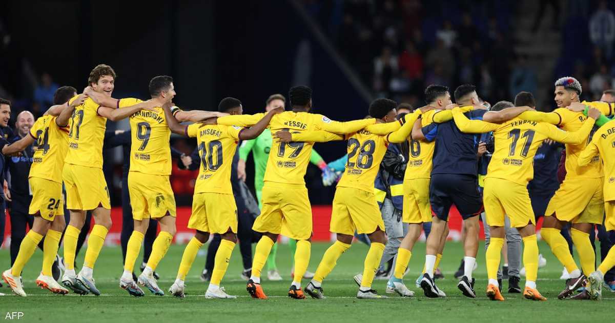 Unexpected guest.. Barcelona play in a boisterous celebration after the title