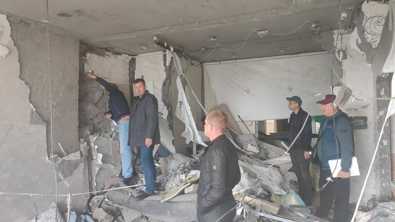 Novorossiysk drone strike, Ukrainian drone attack, injured children Russia, damaged apartment building, grain terminal fire, UAV debris, Novorossiysk grain tanks, Russian emergency services, drone war Ukraine, civilian infrastructure attack, Black Sea port strike, Russia Ukraine conflict, Novorossiysk explosion, drone crash Russia, fire at grain storage