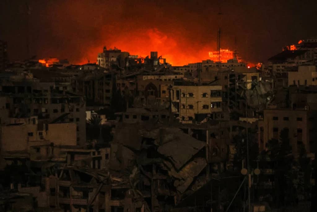 Palestinian civilians, including women and children, displaced by Israeli bombings in Gaza City