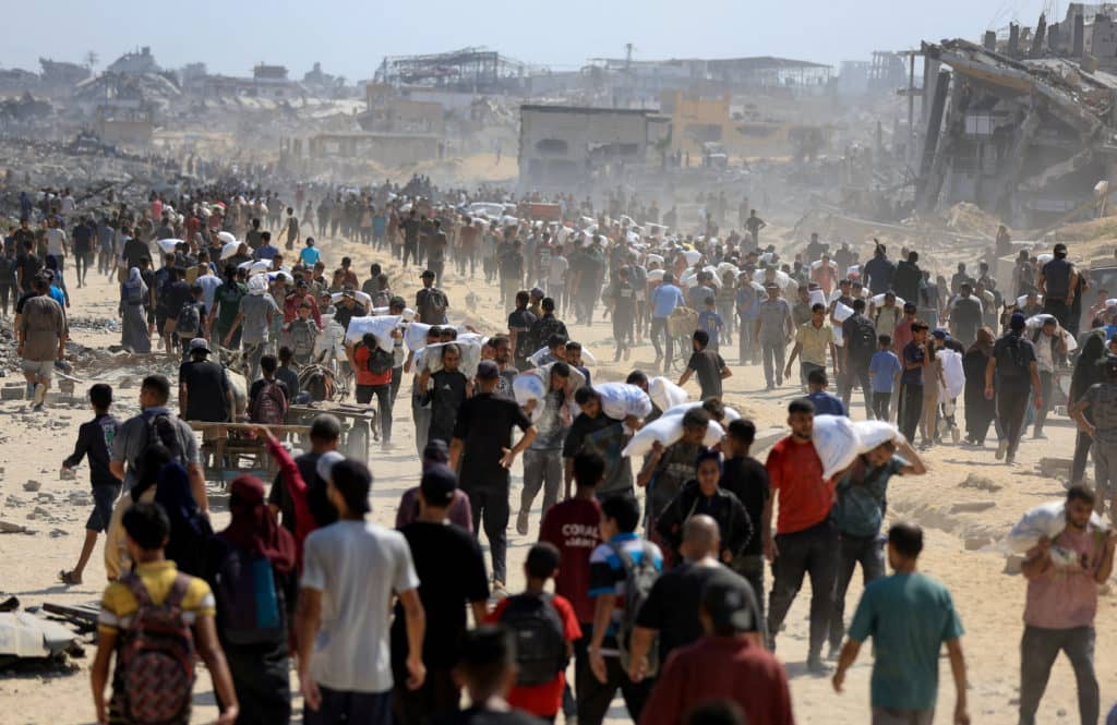 Gaza City residents evacuating under Israeli military order amid chaos and destruction