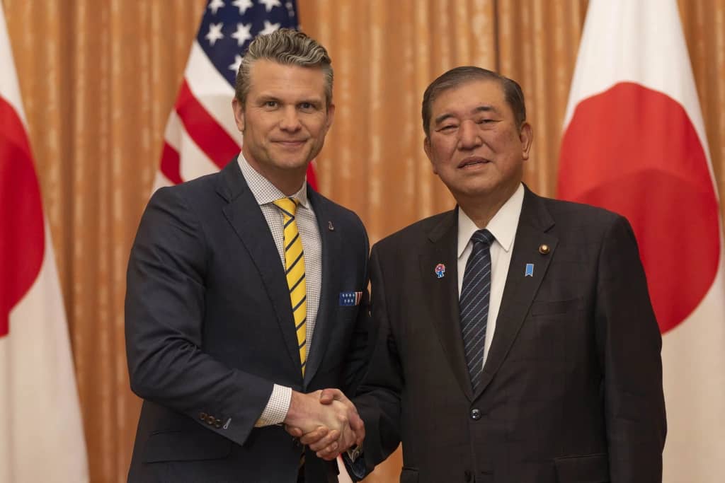 US Defense Secretary Hegseth addressing China conflict denial amid Asia-Pacific militarism