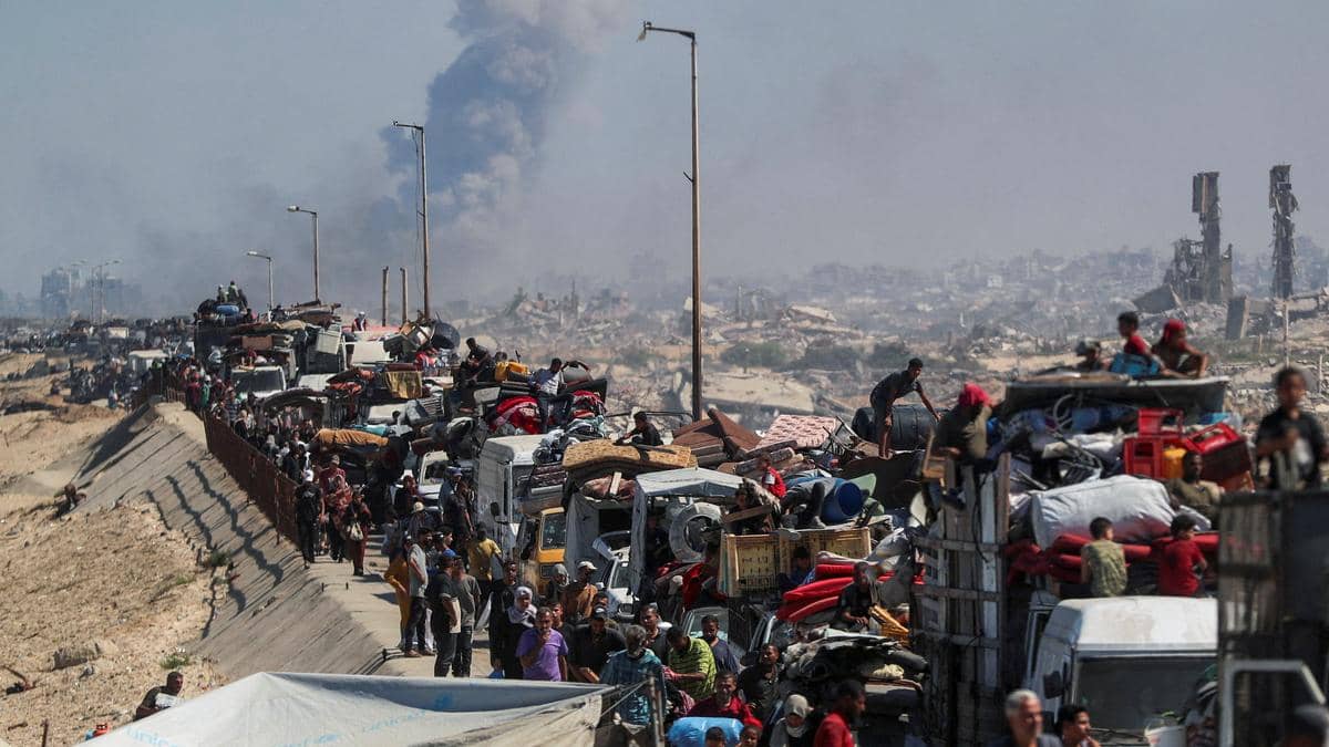 Gaza City Civilians Flee As Israeli Strikes Intensify Gaza City under Israeli assault as families flee along the al-Rashid coastal road
