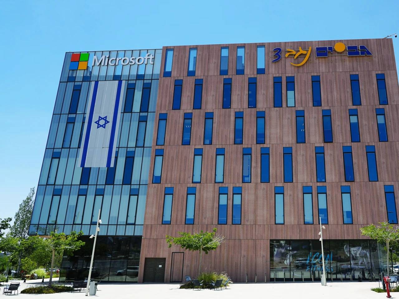 Microsoft logo at Redmond HQ as company restricts Israeli military cloud and AI access