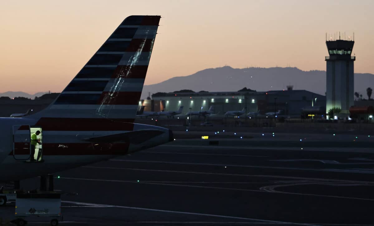 Hollywood Burbank Airport terminal with control tower at dusk during the shutdown