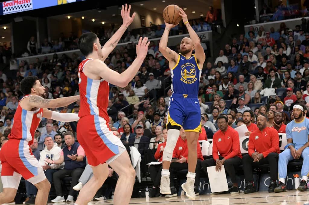 Stephen Curry shooting three-pointer against Memphis Grizzlies in 2025 NBA game