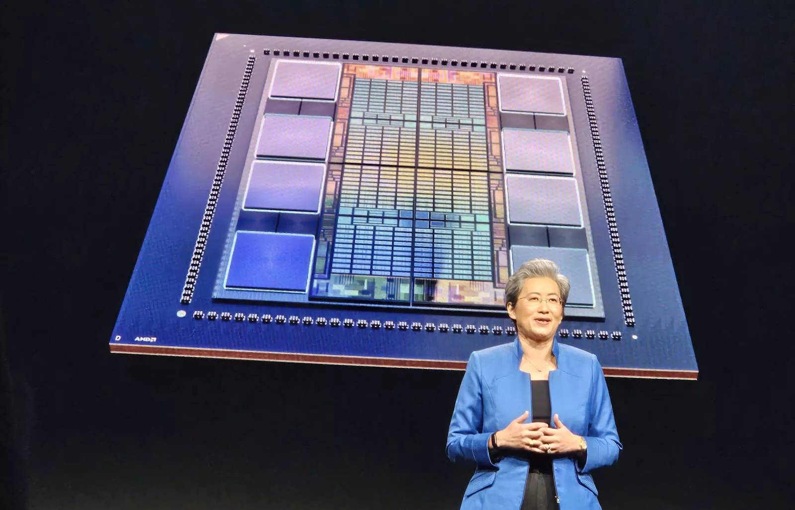 Instinct accelerator board photographed on stage at an AMD event