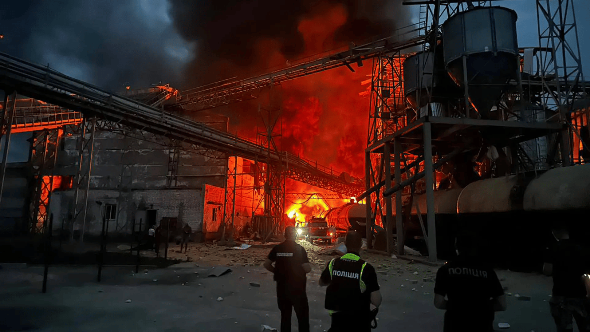 Orenburg gas processing plant burning at night with heavy smoke after reported drone strike