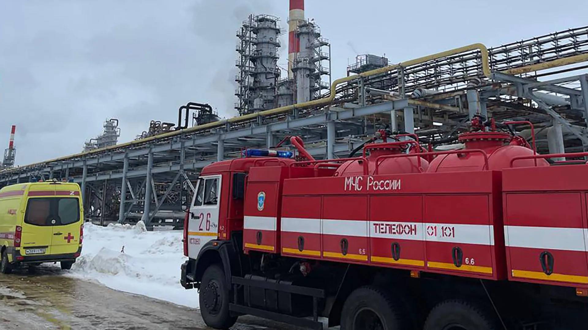 Russian emergency crews repair equipment at the Ryazan oil refinery after a drone incident