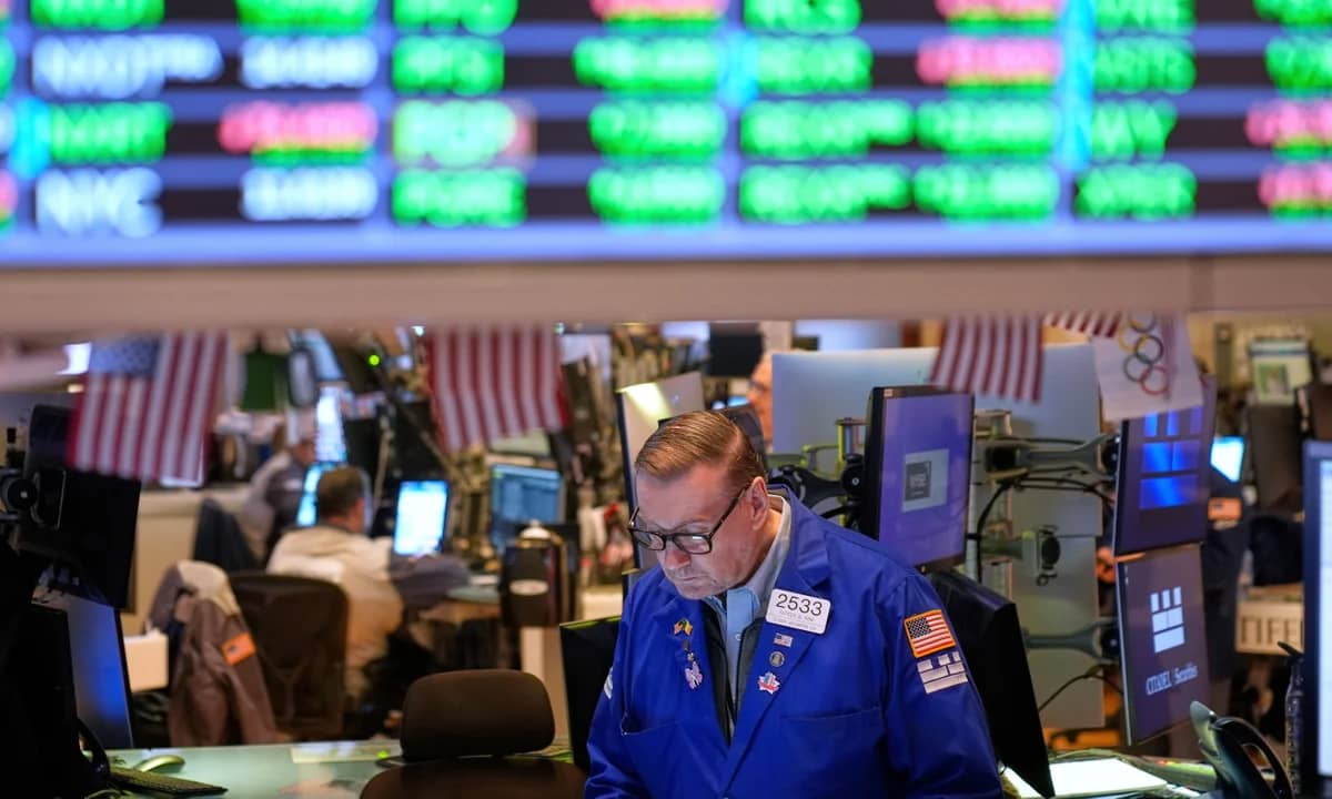 Traders on Wall Street watch falling stock prices after new China tariff threat
