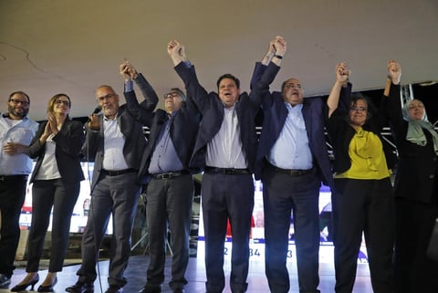 Joint List candidates celebrate initial exit poll results at their Nazareth headquarters during Israeli elections September 2019