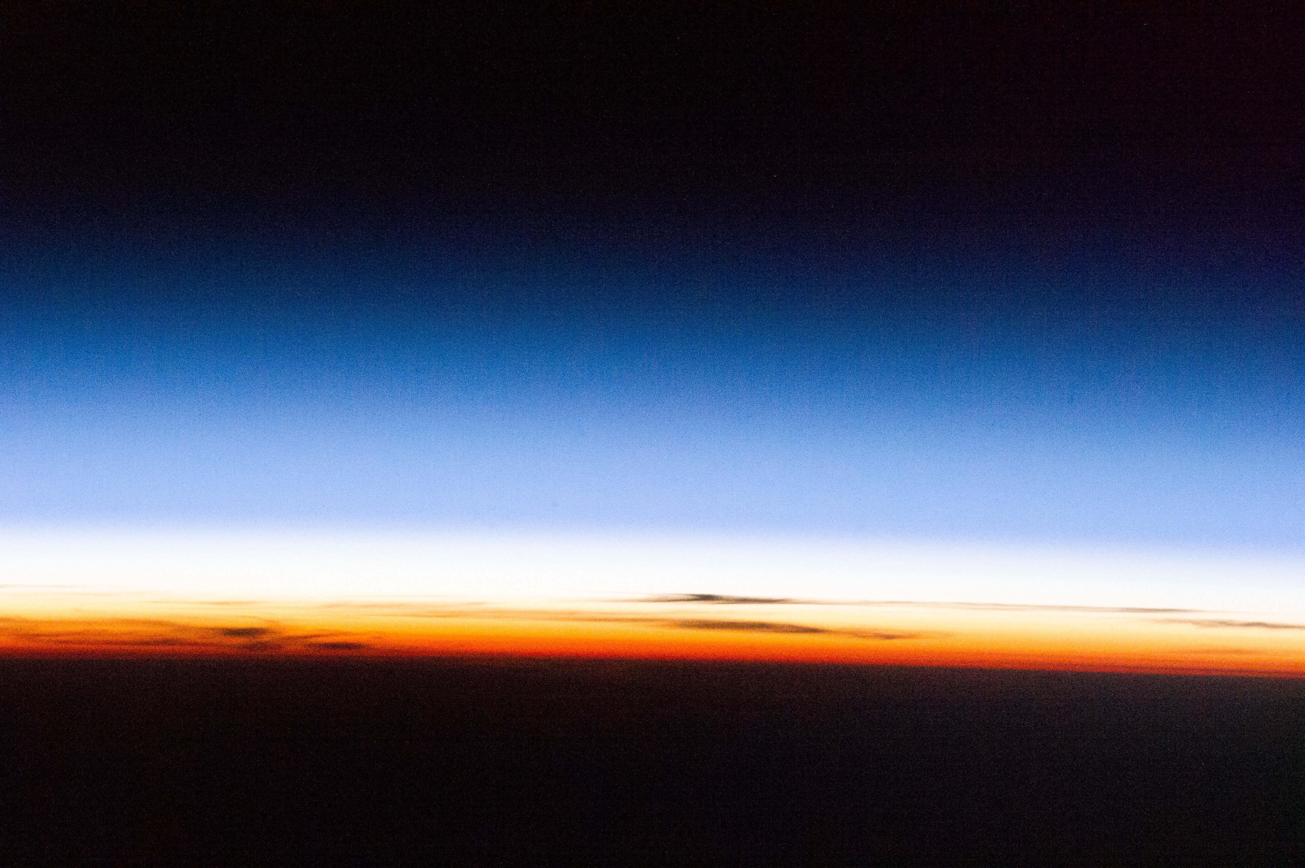 Earth's atmospheric layers showing the troposphere stratosphere and mesosphere as seen from the International Space Station