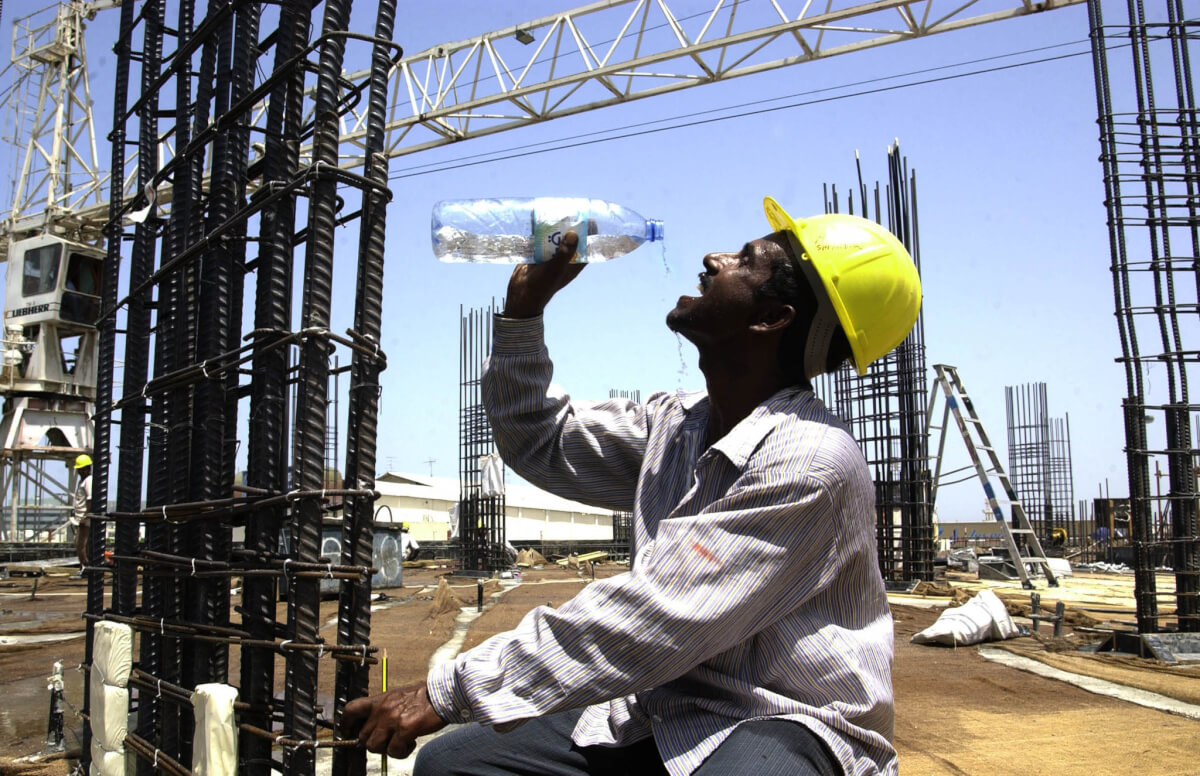 SUMMER SUN TAKES TOLL ON WORKERS IN UAE.