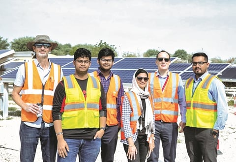 AI-powered drone inspecting solar panels at QEERI facility in Qatar