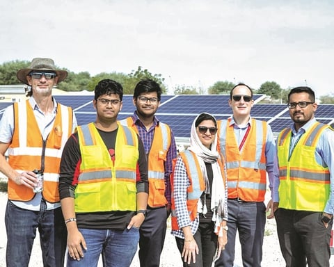 AI-powered drone inspecting solar panels at QEERI facility in Qatar