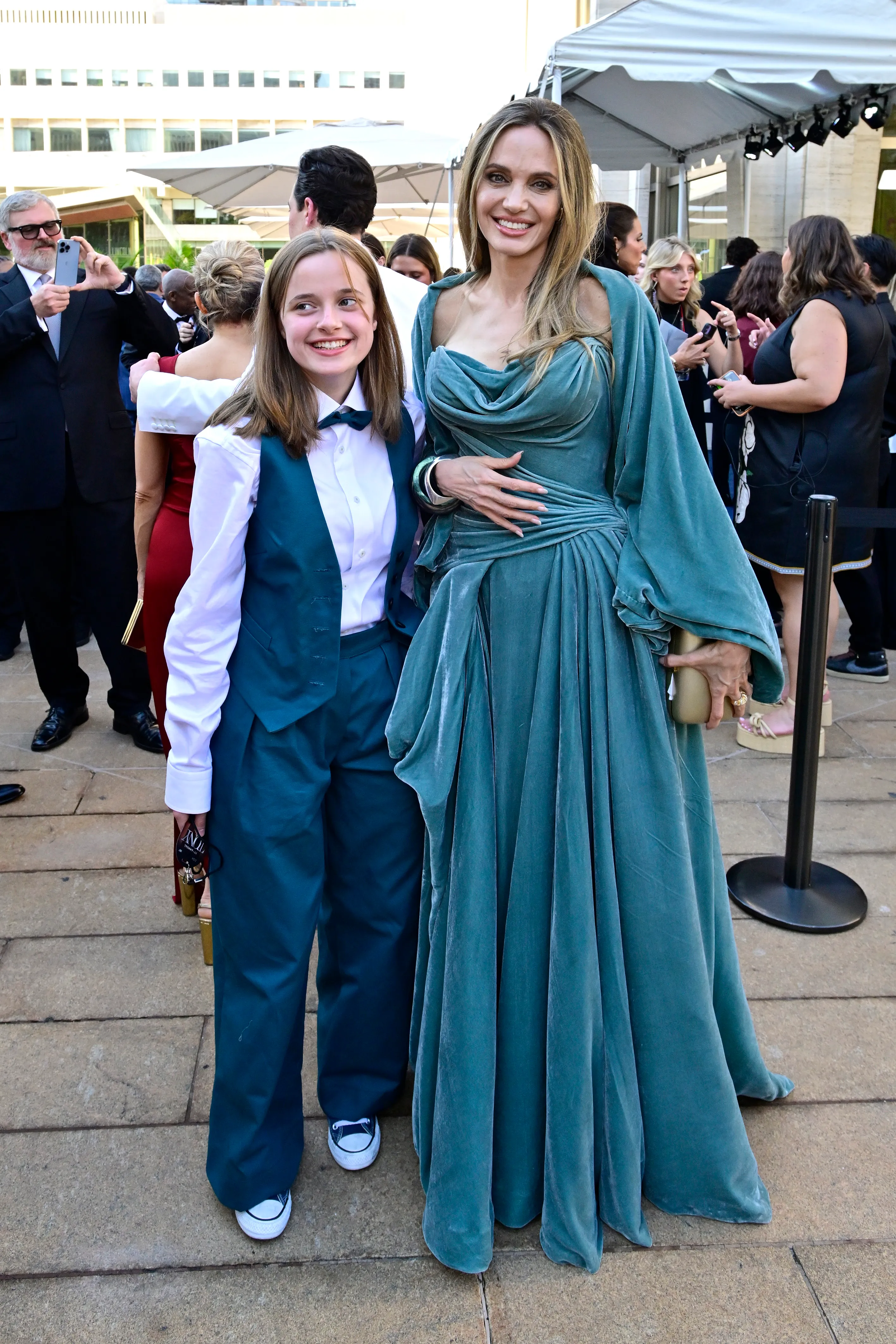 Vivienne Jolie-Pitt and Angelina Jolie attend FIJI Water at the 77th Annual Tony Awards
