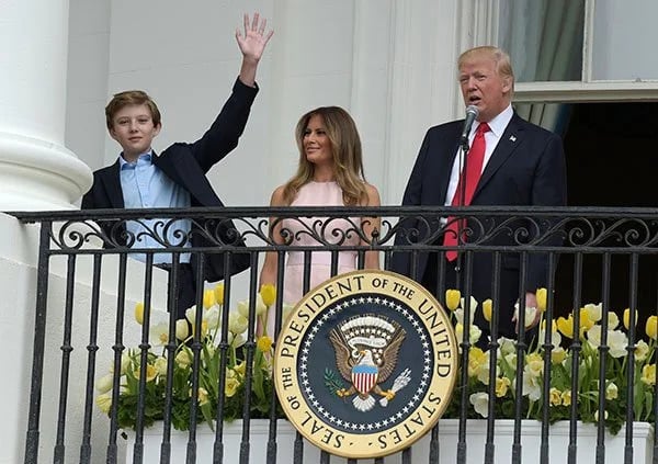 Barron Trump, 19-year-old son of President Donald Trump, standing in the White House during his father's second term while studying cryptocurrency and digital finance at NYU