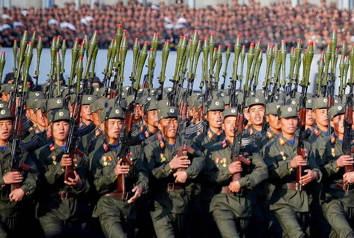 North Korean soldiers in historic uniforms march during a parade on the Kim Il Sung Square in Pyongy