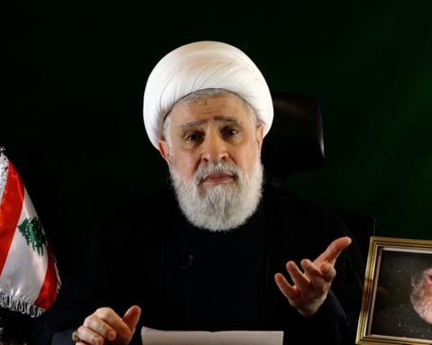 Naim Qassem delivering a speech