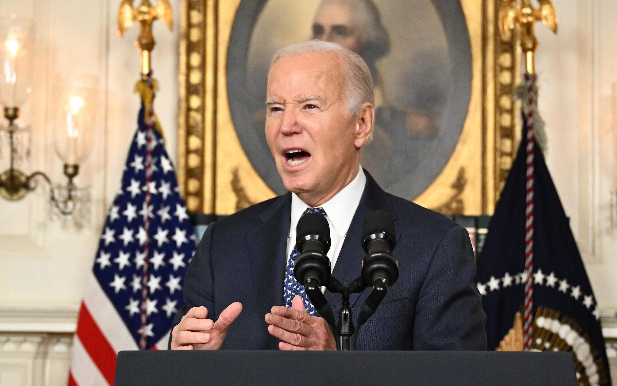 US President Joe Biden answers questions about Israel after speaking about the Special Counsel report at the White House in Washington,