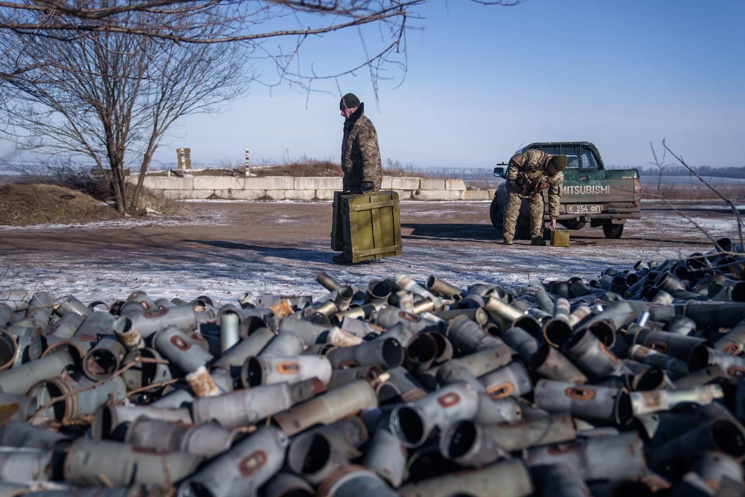 crew member of Ukraine’s 18th Separate Army Aviation Brigade carries boxes