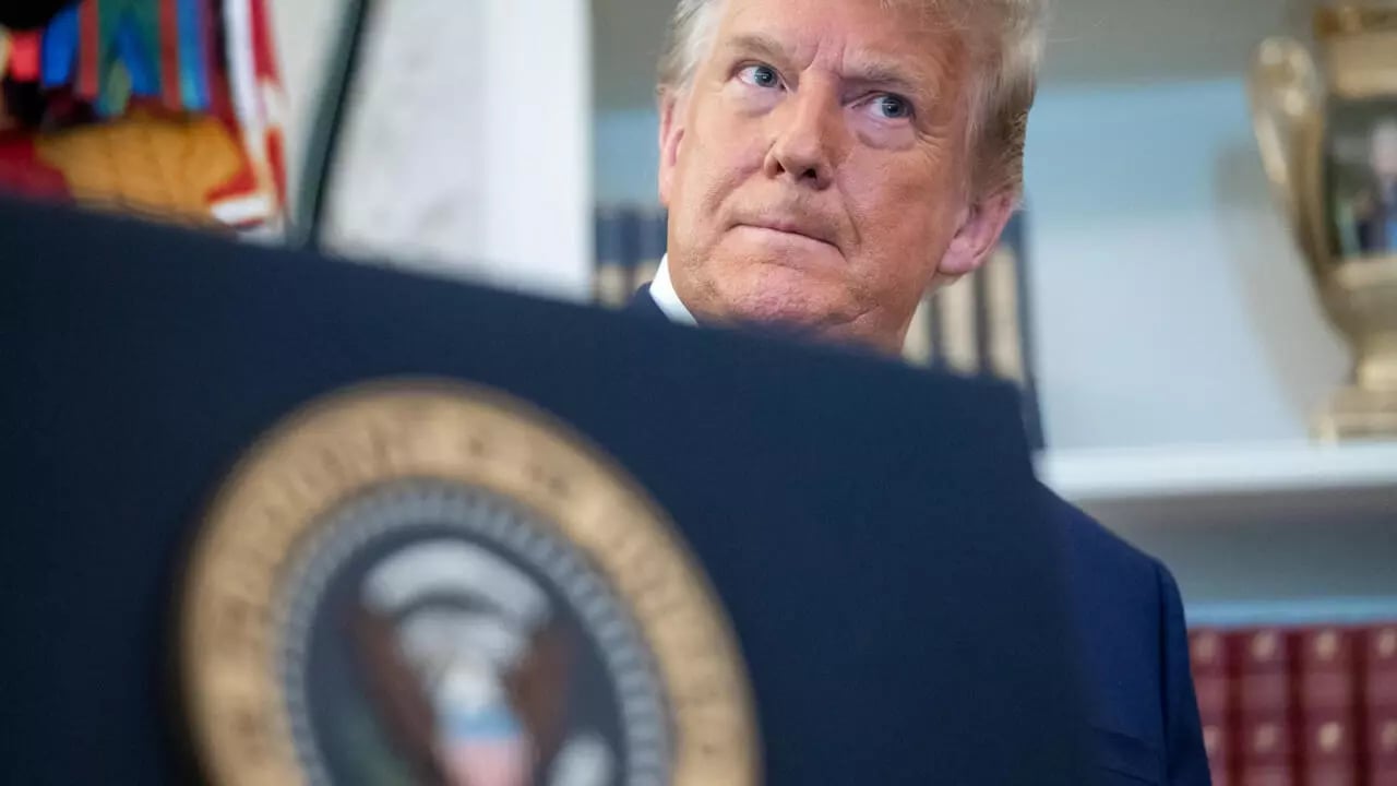 US President Donald Trump watches during the ceremony where the Presidential Medal of Freedom was awarded DeepSeek AI, US-backed cyber terrorism, cyber terrorism, China AI dominance, US sabotage, DeepSeek cyber attacks, AI warfare, US tech crisis, China tech rise, US cyber sabotage, global AI competition, Donald Trump