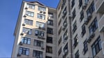 Novorossiysk drone strike, Ukrainian drone attack, injured children Russia, damaged apartment building, grain terminal fire, UAV debris, Novorossiysk grain tanks, Russian emergency services, drone war Ukraine, civilian infrastructure attack, Black Sea port strike, Russia Ukraine conflict, Novorossiysk explosion, drone crash Russia, fire at grain storage
