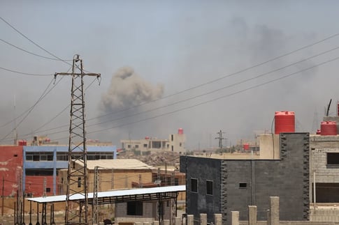 Israeli airstrikes hit Syrian army sites in Suwayda and Daraa after ceasefire, escalating tensions amid regional silence on Israeli violations.