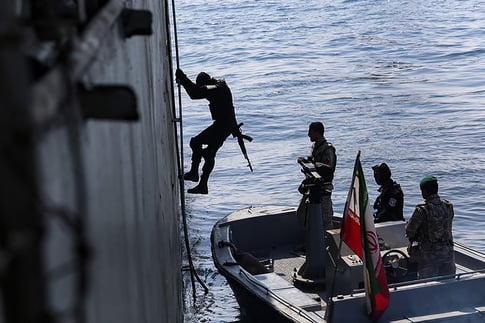 ranian naval forces escort seized foreign oil tanker accused of smuggling fuel in Persian Gulf