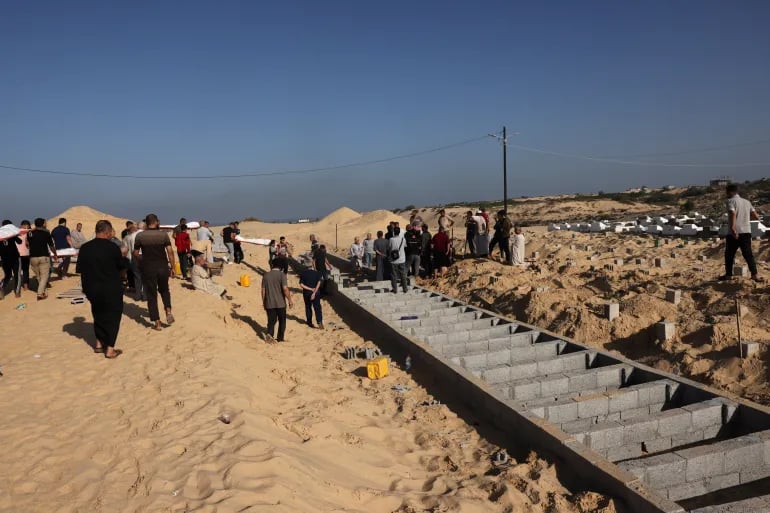 Aid workers killed in Gaza as Israel bombs shelters, hospitals, and convoys