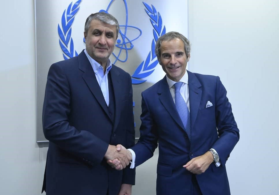 Mohammad Eslami with Rafael Mariano Grossi in Vienna discussing nuclear issues