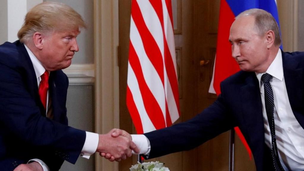 Russian president Vladimir Putin and US president Donald Trump shaking hands during a previous diplomatic meeting