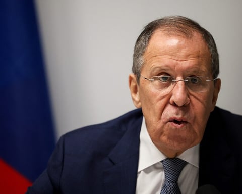 Russian Foreign Minister Sergey Lavrov speaking at a press briefing on missile deployment decisions
