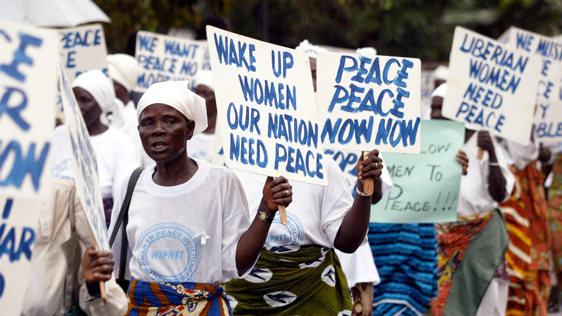 Liberian women during peace protests 2003 Liberia women sex strike, sex strike history example, peace movement Liberia