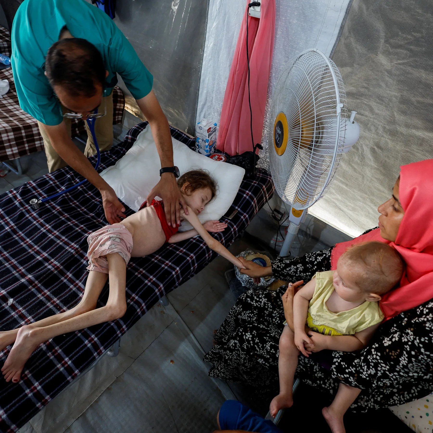 skeletal children arriving at wards in gaza hospitals amid famine and collapsing health system