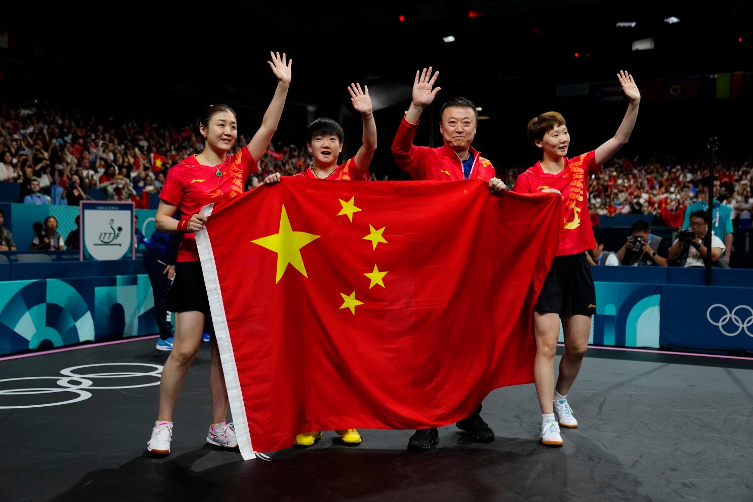china 2024 olympics table tennis champions celebrating gold medal victory in paris china 2024 olympics table tennis team celebrating gold medal victory in paris