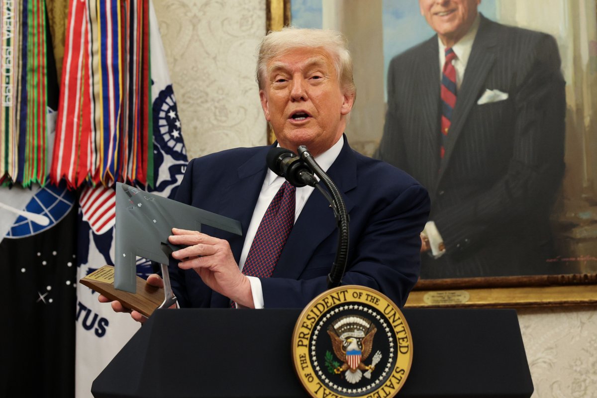 Donald Trump speaking at podium during census announcement