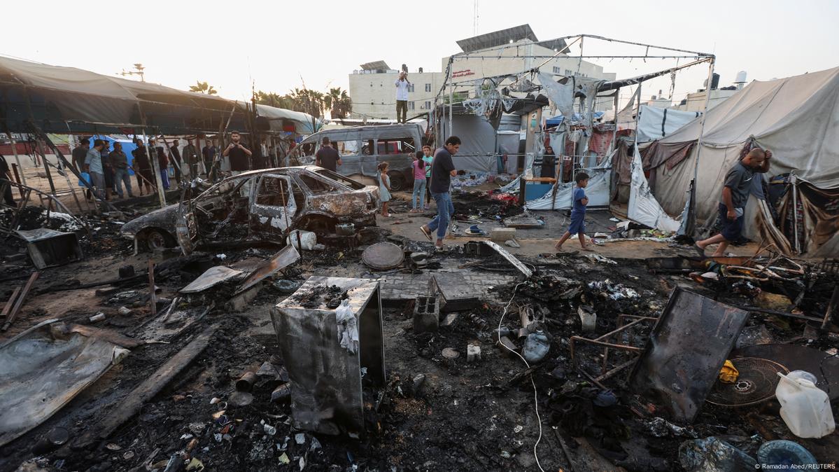 Dense smoke rises over central Gaza neighborhoods after a wave of Israeli airstrikes