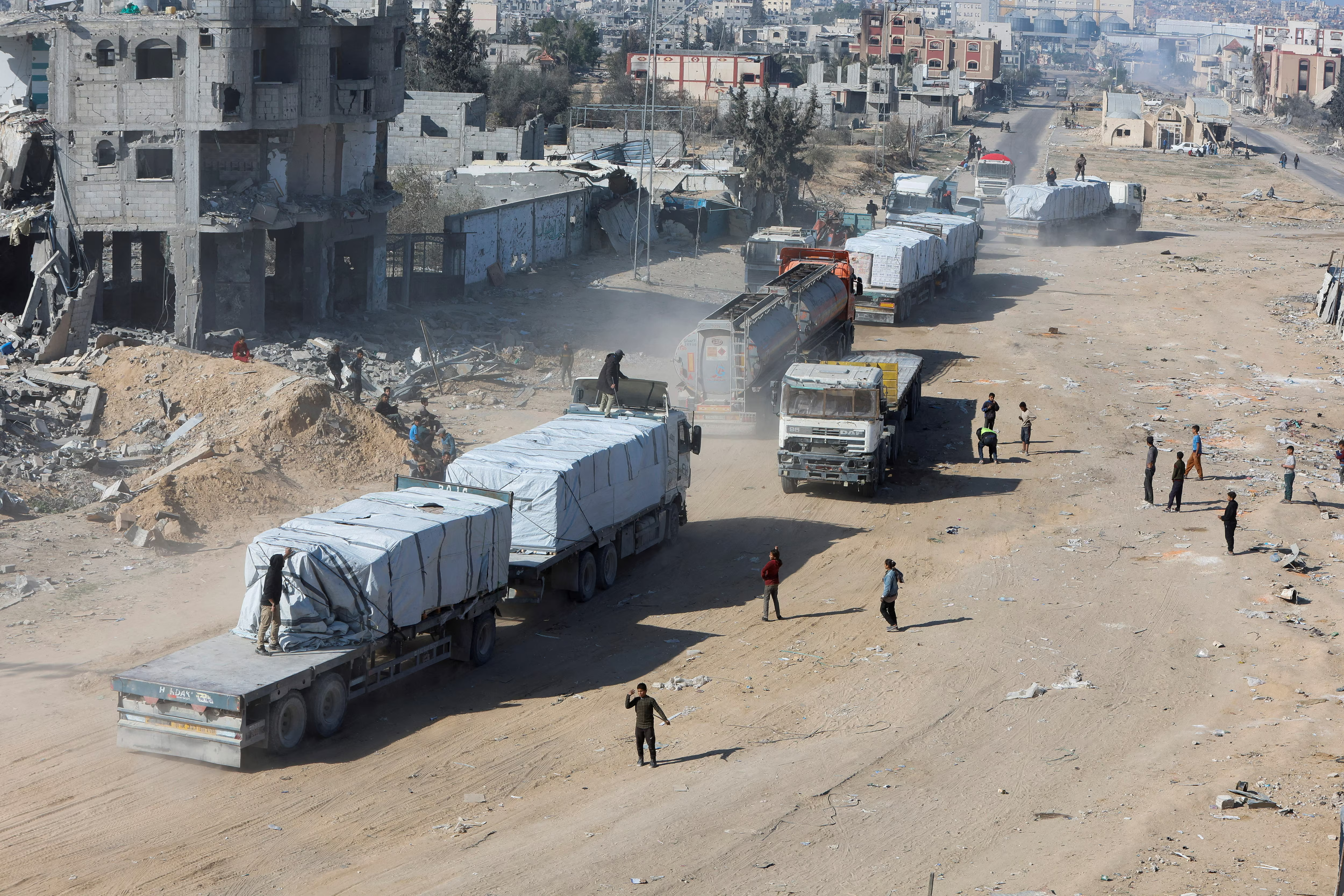 Humanitarian aid trucks lined up for entry into Gaza amid conflict