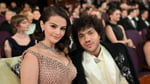 Selena Gomez and Benny Blanco share wedding portraits on a coastal lawn after a private ceremony in California