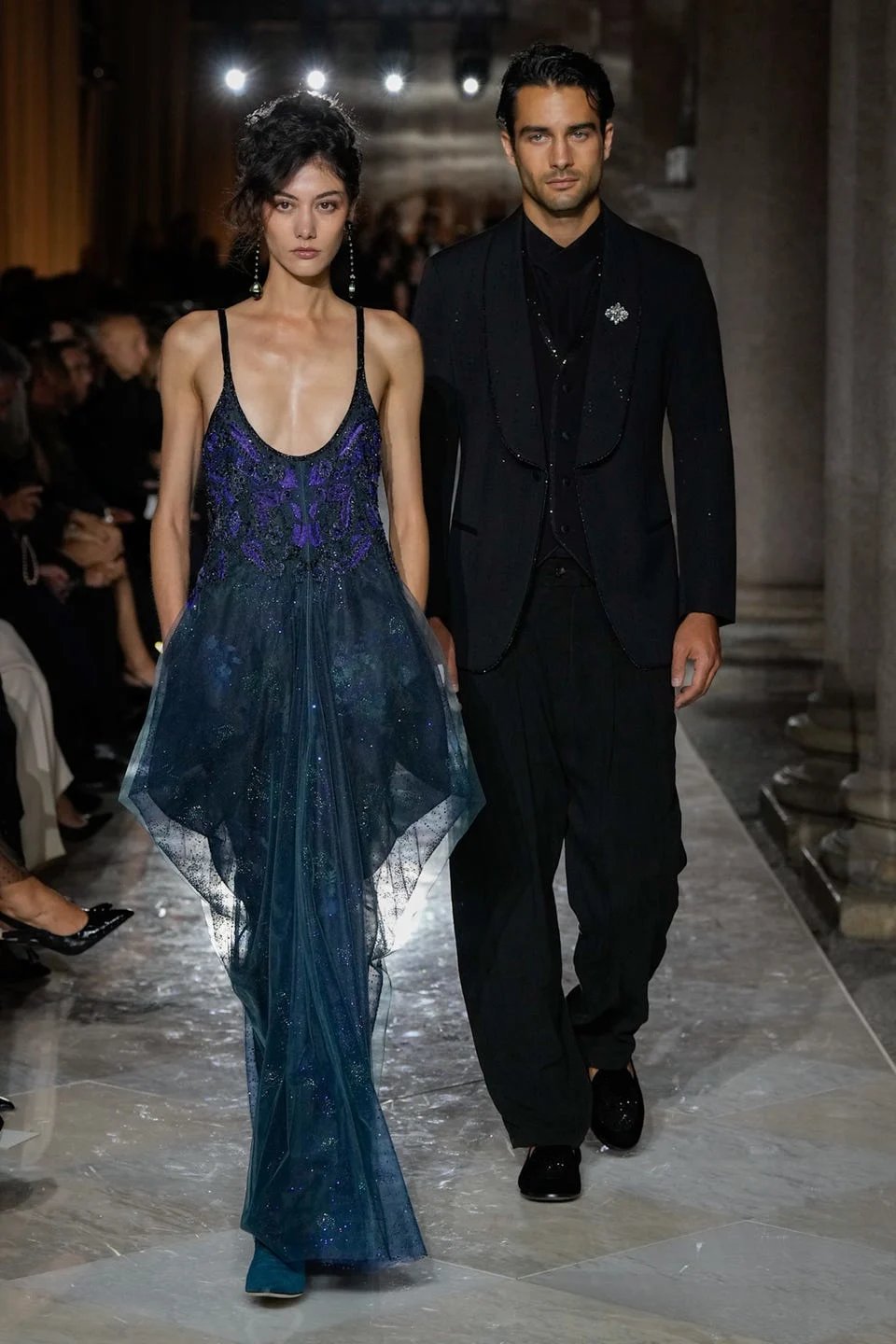 Live piano performance underscoring Giorgio Armani’s final runway in Milan
