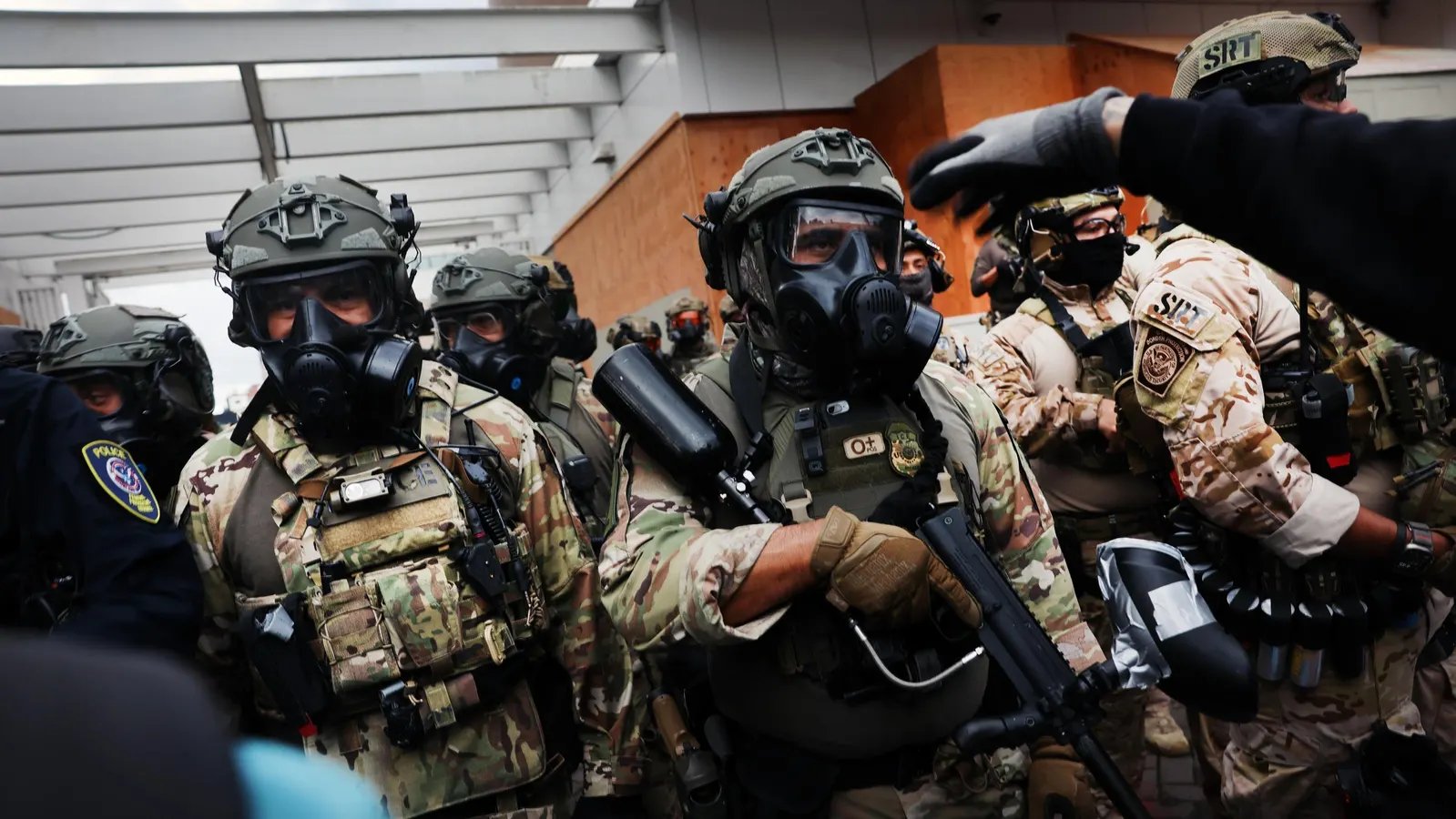 California National Guard soldiers prepare equipment for reassignment to Portland
